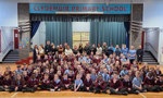 Staff and pupils at Clydemuir Primary School along with community partners and Vice Convener of Educational Services, Councillor John Millar