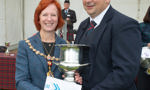 Provost Karen Murray Conaghan presents the winning trophy to Field Marshal Montgomery Pipe Band