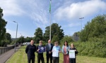 Councillor McGinty and Millar with pupils and staff from Riverside School 