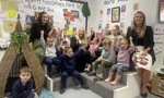 Staff and children at Carleith Primary School Early Learning and Childcare Centre in Duntocher