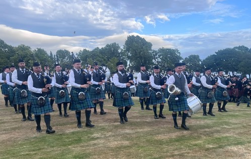 Inveraray and District Pipe Band march with winners trophy