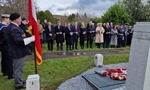 Provost Karen Murray Conaghan and officials lay wreaths at the communal grave in Old Dalnottar Cemetery.