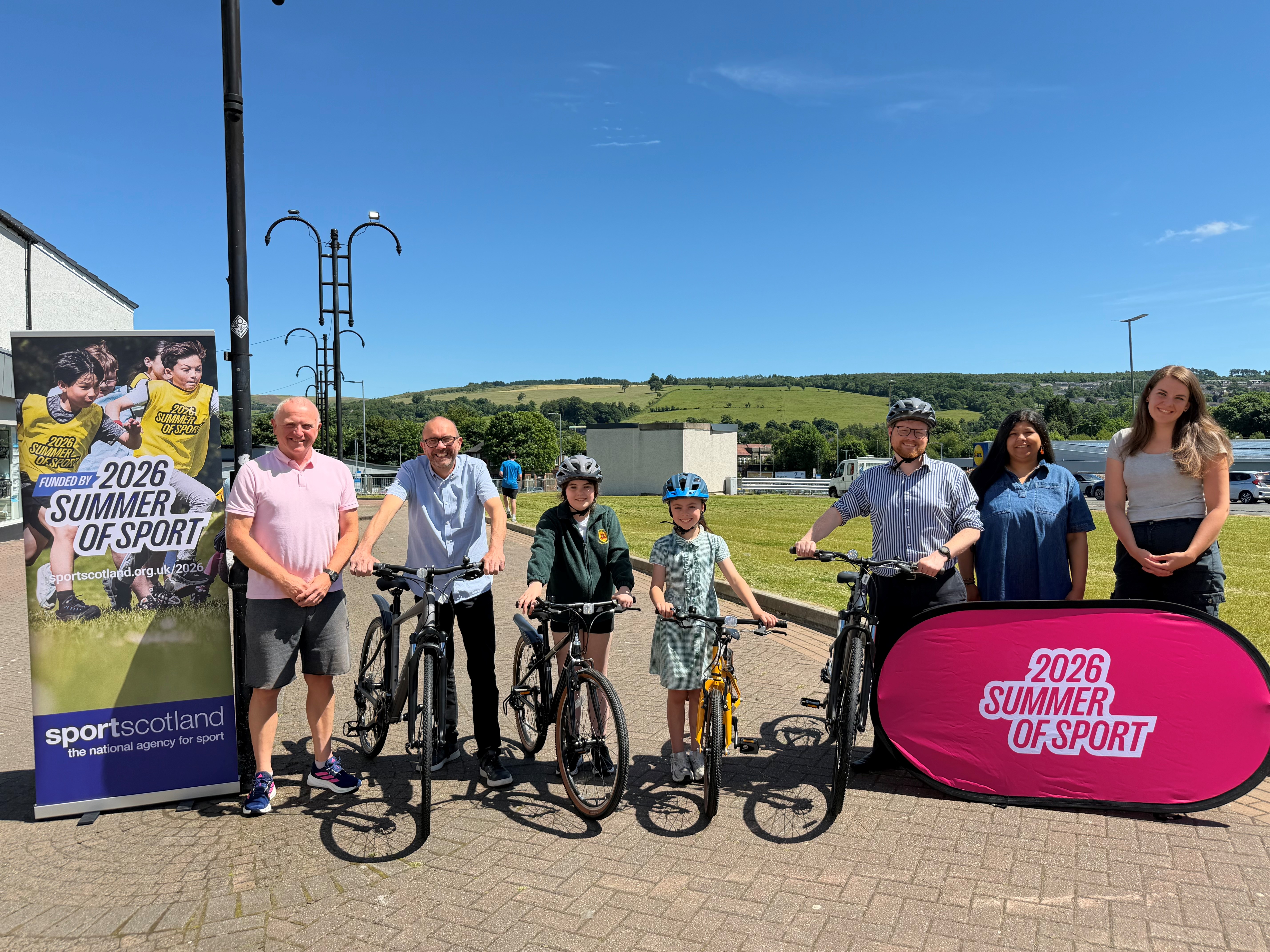 Cllr David McBride, William Rooney, with pupils from St Mary's, Vale of Leven Trust & council employee