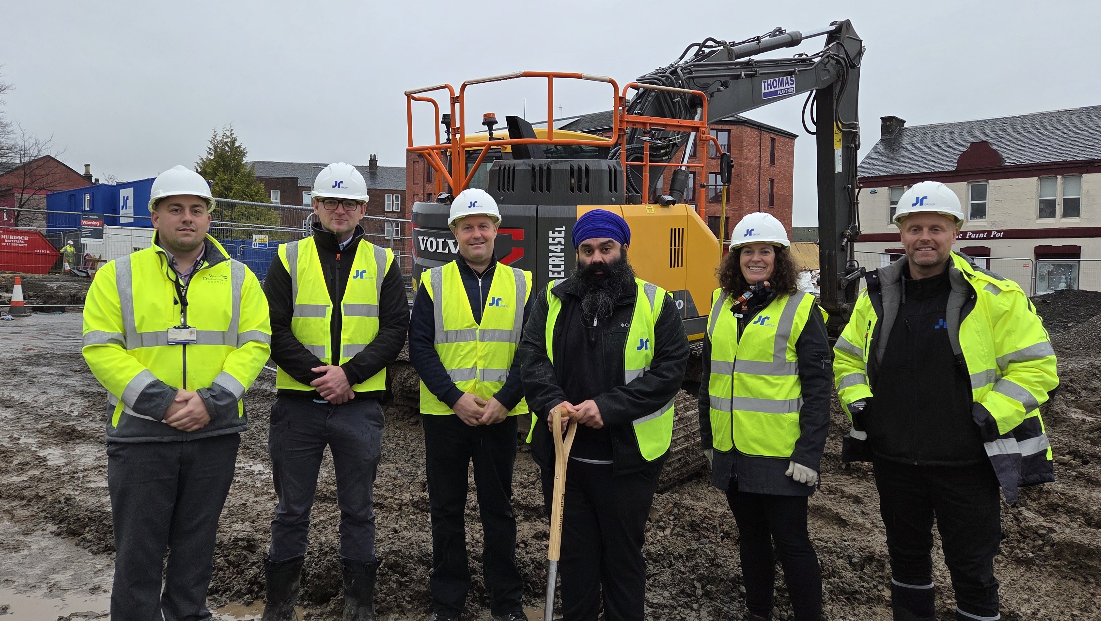 Councillor Gurpreet Singh Johal and officials from West Dunbartonshire Council and The JR Group at the sod-cutting ceremony for the Bank Street sheltered housing development in Alexandria.