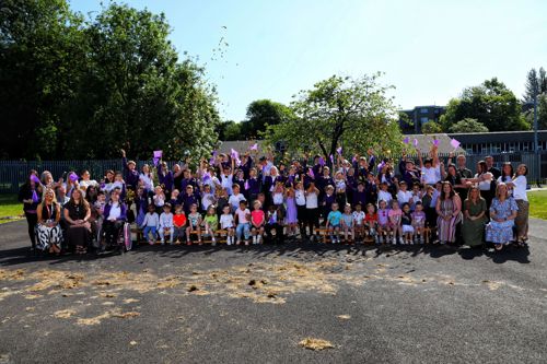 School photo - Teachers and school children