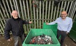 Convenor David McBride and Vice Convenor Lawrence O'Neill at battery bin 