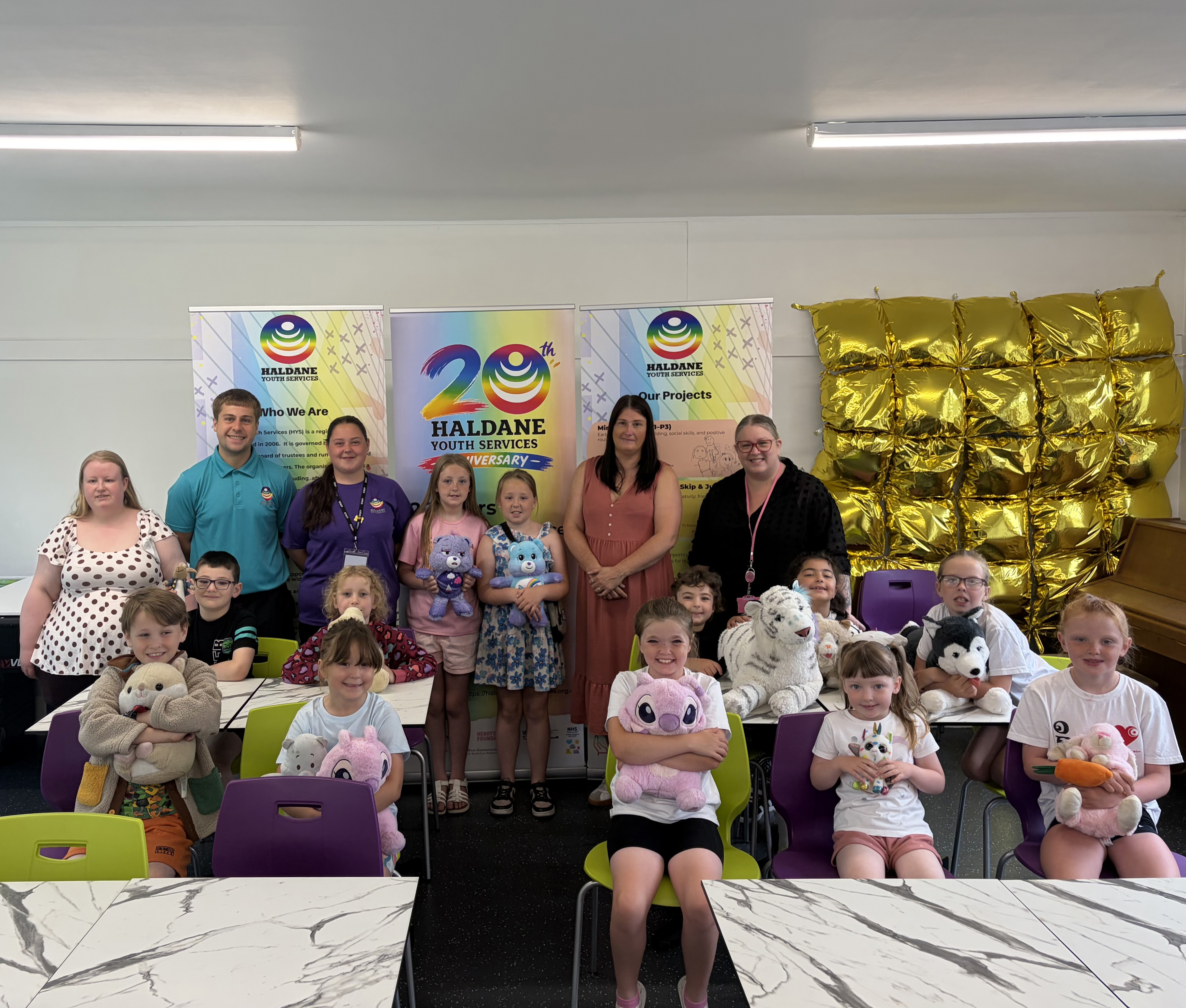 Councillor Michelle McGinty with SHINE staff and pupils during a summer activity with toys.